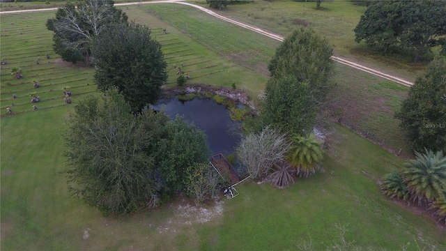 aerial view featuring a rural view and a water view