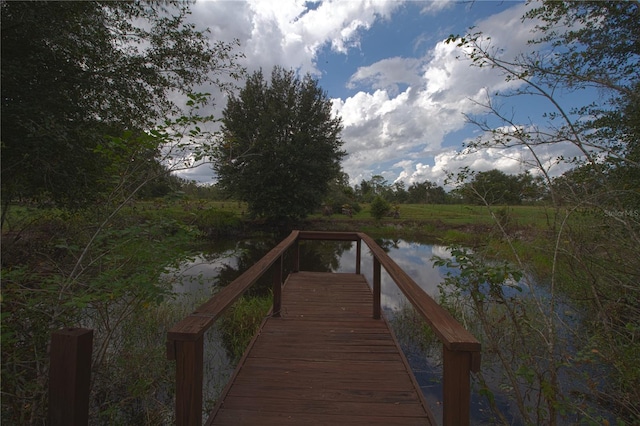 view of dock with a water view