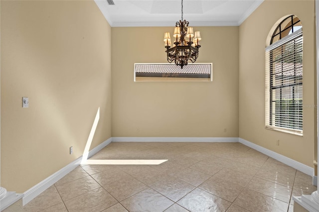 empty room featuring crown molding, light tile patterned floors, and a notable chandelier