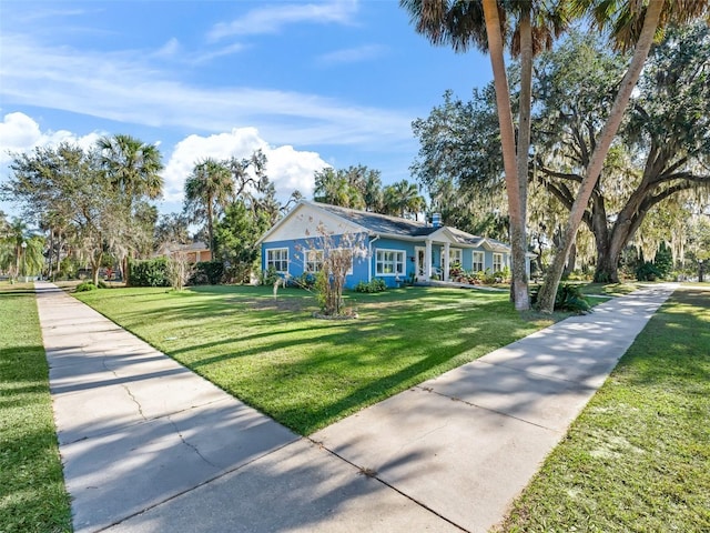 single story home with a front yard