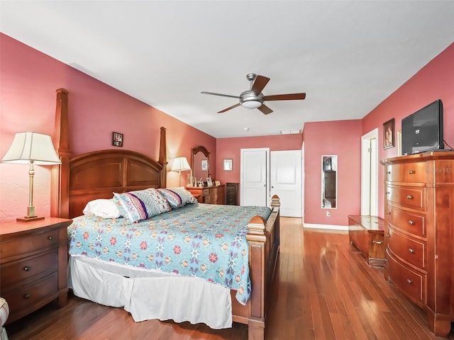 bedroom featuring hardwood / wood-style flooring and ceiling fan