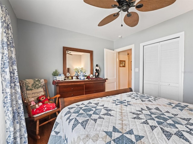 bedroom featuring ceiling fan, a closet, and hardwood / wood-style floors