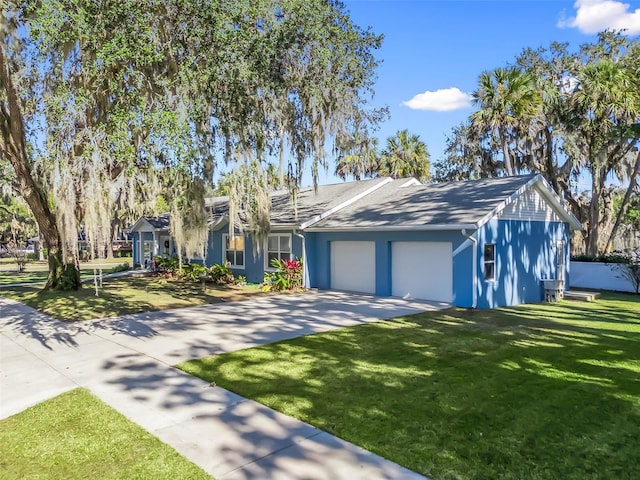 single story home with a front lawn and a garage