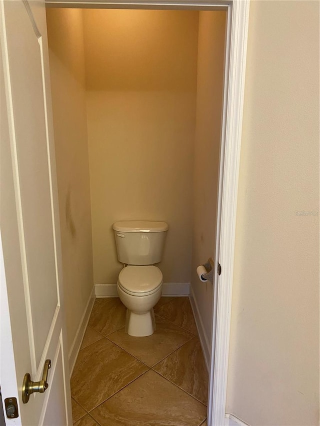 bathroom featuring toilet