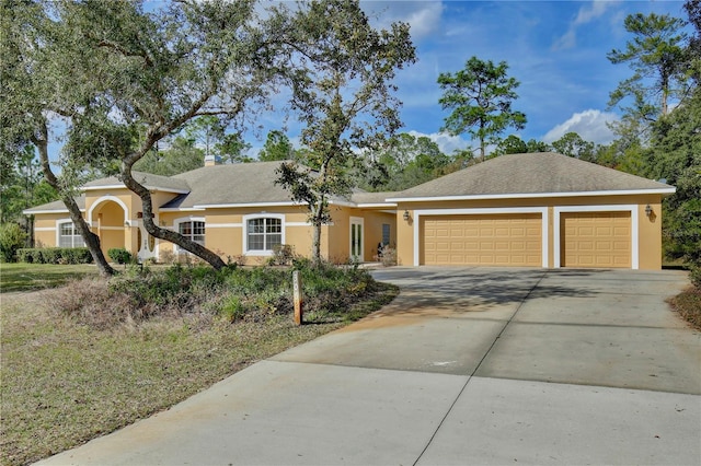 ranch-style home with a garage