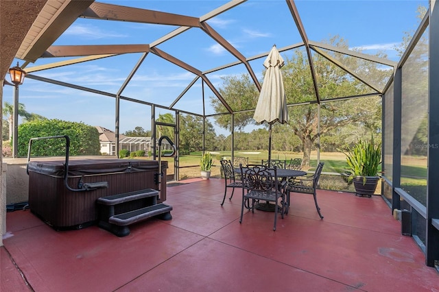 view of patio with glass enclosure and a hot tub