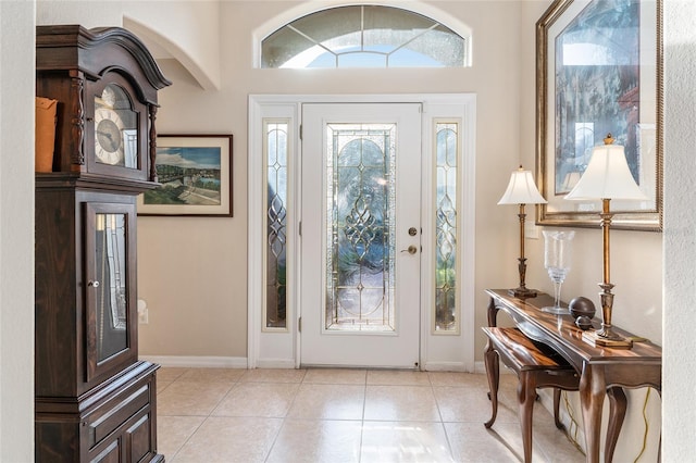 entryway featuring light tile patterned floors