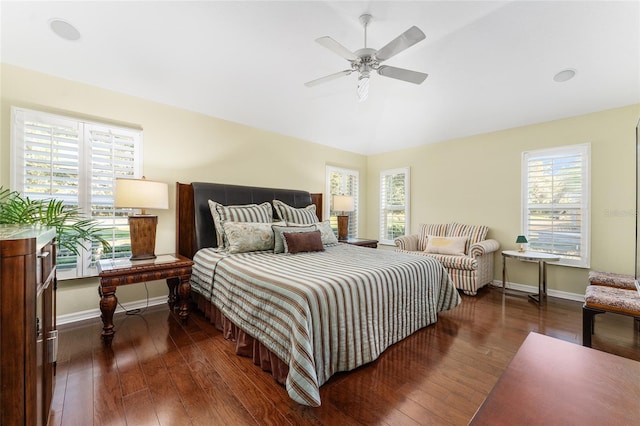 bedroom featuring ceiling fan and dark wood-type flooring