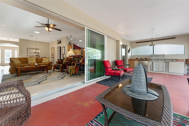 view of patio / terrace with an outdoor hangout area, area for grilling, and ceiling fan