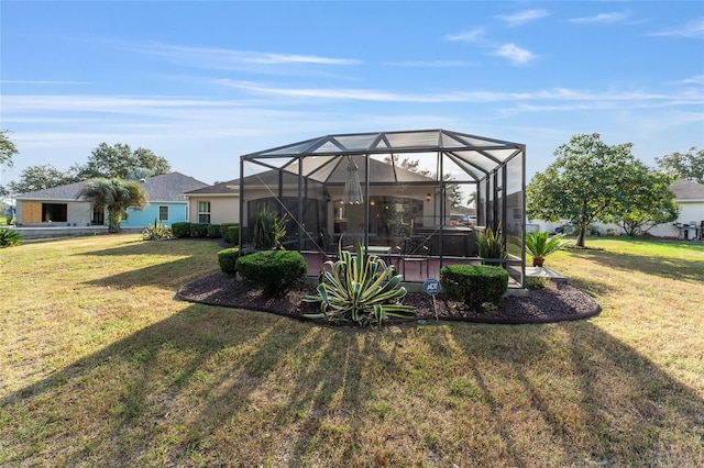 view of yard featuring glass enclosure