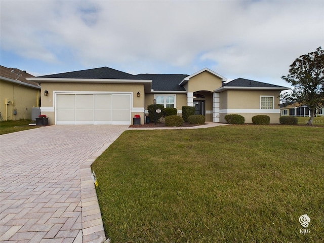 single story home with a front lawn and a garage