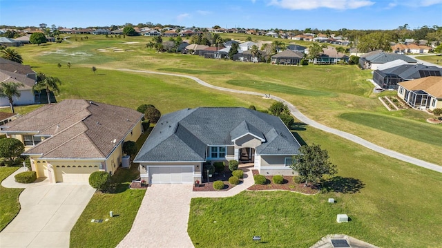 bird's eye view with a residential view and view of golf course