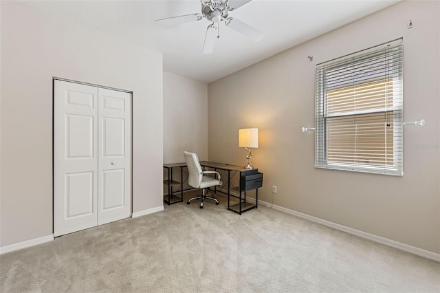 office featuring carpet flooring, baseboards, and ceiling fan