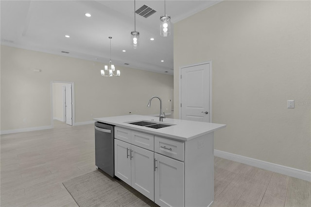 kitchen with stainless steel dishwasher, a kitchen island with sink, crown molding, sink, and pendant lighting