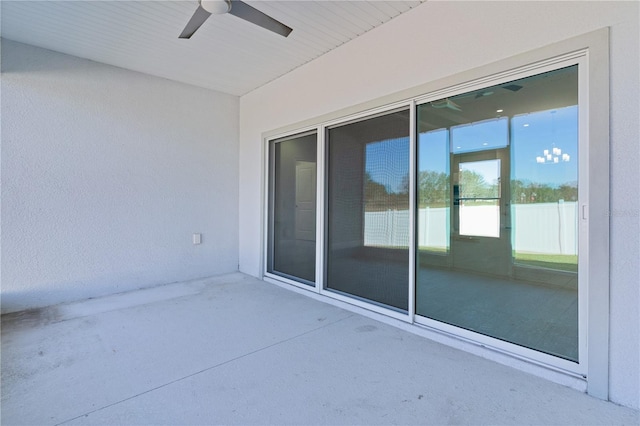 view of patio featuring ceiling fan