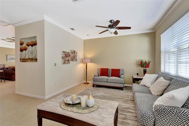 living room featuring ceiling fan, light colored carpet, and ornamental molding