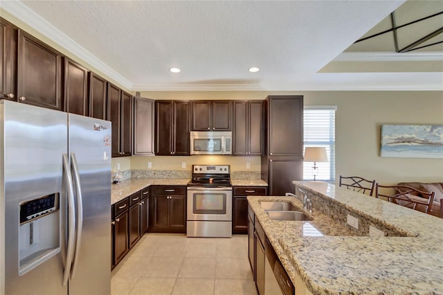 kitchen featuring crown molding, sink, light tile patterned floors, light stone countertops, and appliances with stainless steel finishes