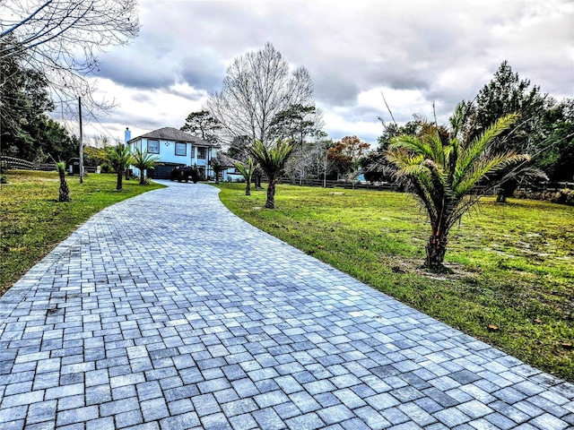 view of community featuring a yard