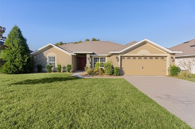 ranch-style home with a front yard and a garage