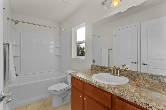 full bathroom featuring tile patterned flooring, vanity,  shower combination, and toilet