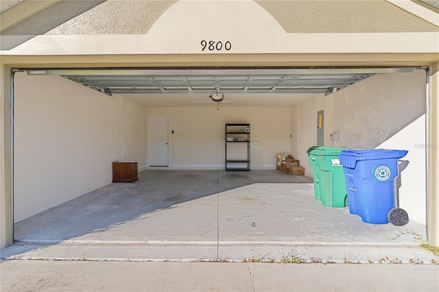 garage featuring a garage door opener