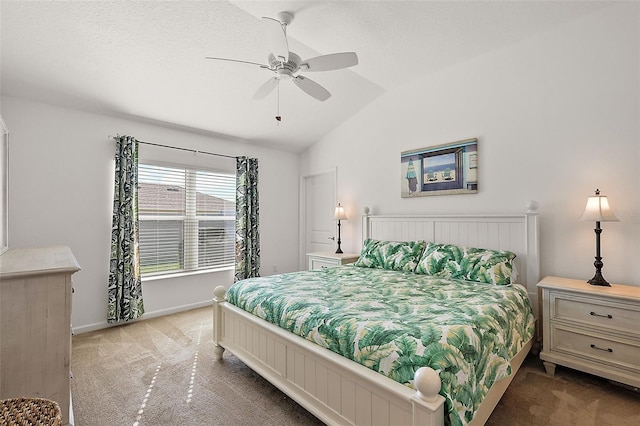 carpeted bedroom with a textured ceiling, ceiling fan, and lofted ceiling