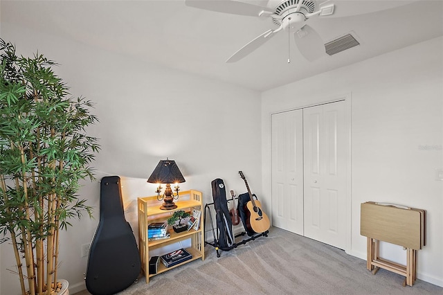 miscellaneous room with carpet and ceiling fan