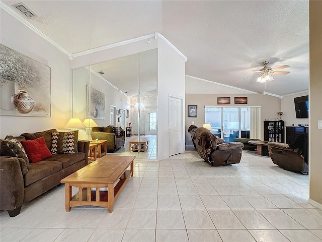 tiled living room featuring vaulted ceiling, ceiling fan, and crown molding