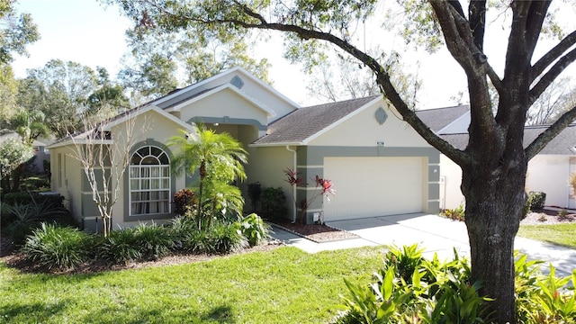 single story home with a garage and a front yard