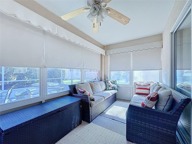 sunroom / solarium with ceiling fan