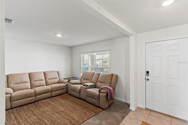 living room featuring light tile patterned flooring