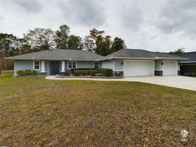 ranch-style home featuring a front yard and a garage