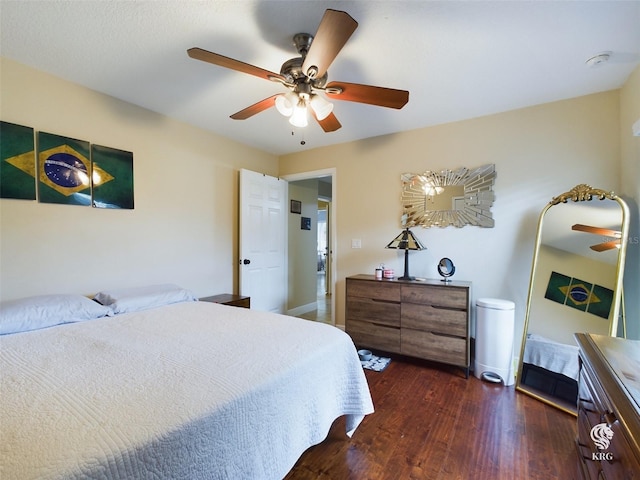 bedroom featuring dark hardwood / wood-style floors and ceiling fan