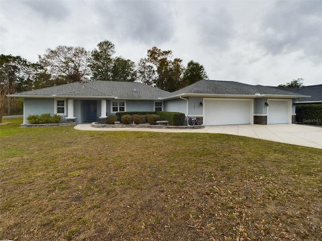 single story home with a garage and a front yard