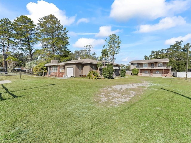 view of yard with a garage