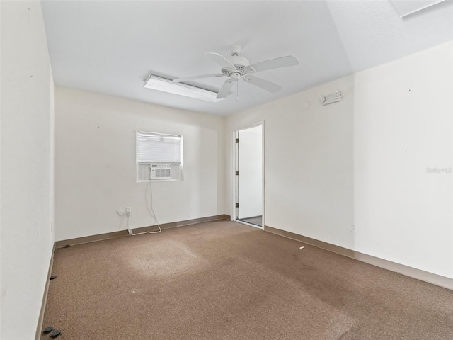 carpeted empty room featuring cooling unit and ceiling fan