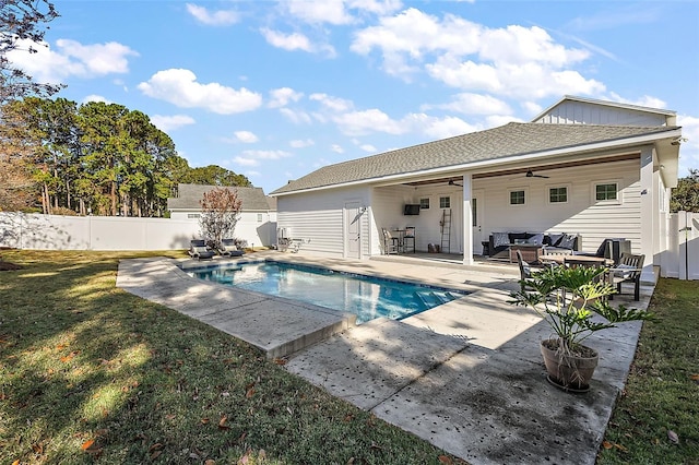 view of swimming pool with a yard, an outdoor living space, a patio, and ceiling fan