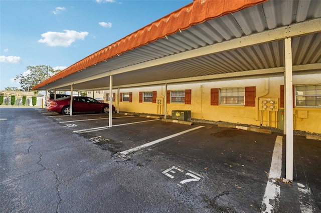 view of parking featuring a carport