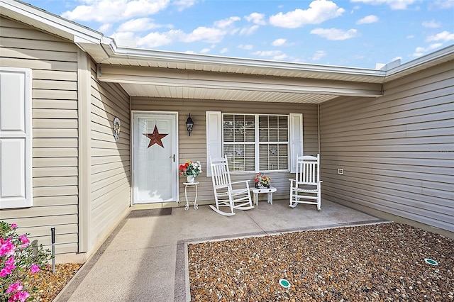 property entrance with covered porch