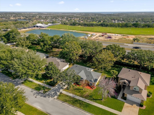 birds eye view of property featuring a water view