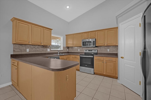 kitchen featuring kitchen peninsula, tasteful backsplash, stainless steel appliances, light tile patterned floors, and high vaulted ceiling