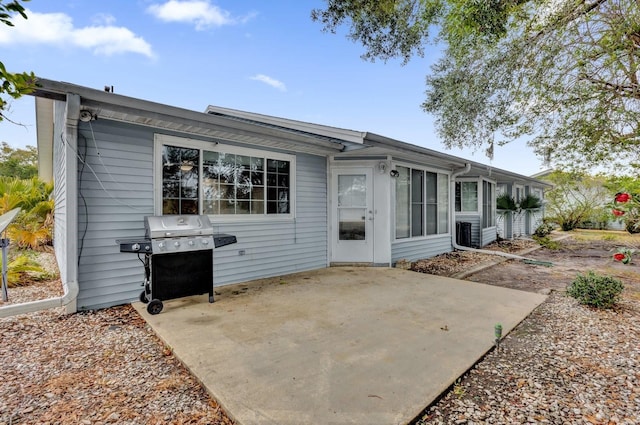 back of property with a patio area