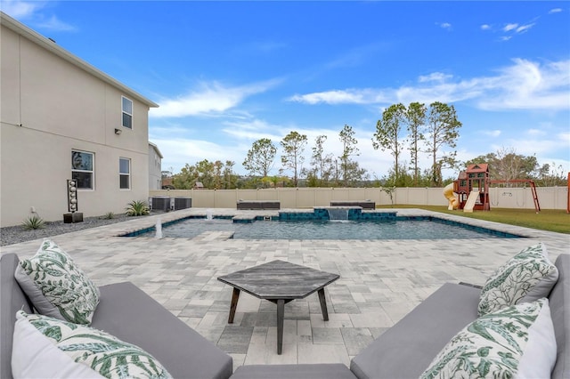 view of swimming pool featuring an outdoor living space, pool water feature, central AC, a playground, and a hot tub