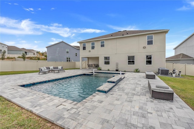 410 Cheeota Ct, Minneola, FL 34715 - view of swimming pool with an outdoor hangout area, a patio, and a fenced backyard