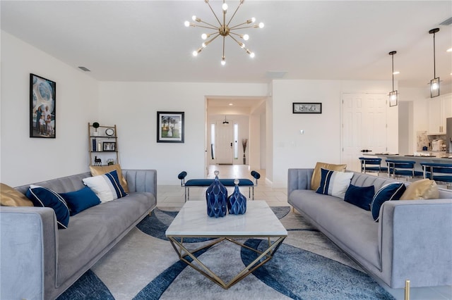 living room with an inviting chandelier