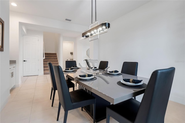 410 Cheeota Ct, Minneola, FL 34715 - dining area featuring stairs, light tile patterned floors, and recessed lighting