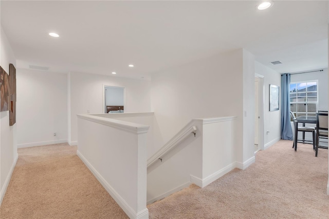 410 Cheeota Ct, Minneola, FL 34715 - corridor featuring an upstairs landing, carpet, and recessed lighting