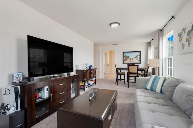 living room with light colored carpet