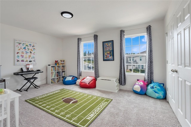 410 Cheeota Ct, Minneola, FL 34715 - recreation room featuring carpet floors and baseboards