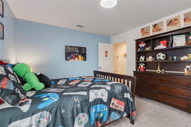 bedroom featuring light colored carpet